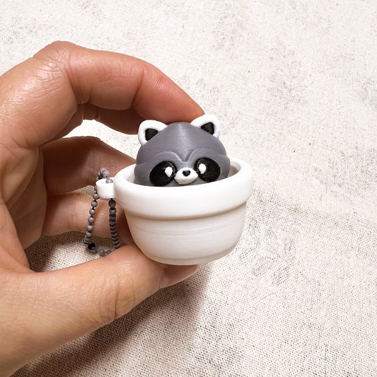 Clicker Mapache Macetero